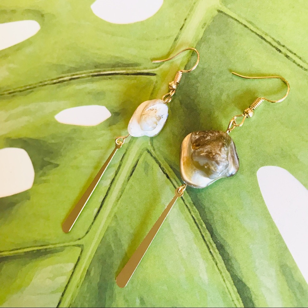 Natural shell and gold irregular long earrings.
